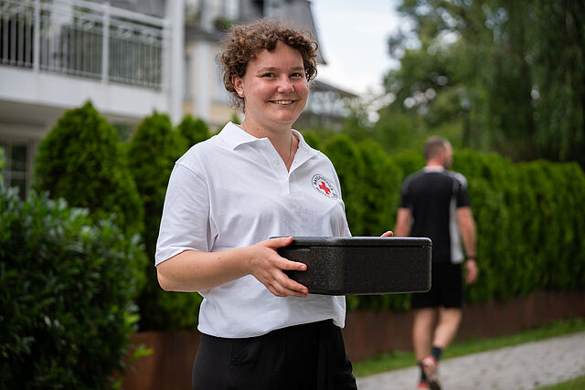 Übergabe Essen auf Rädern